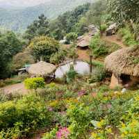 Traditional Hmong Village with Waterfalls