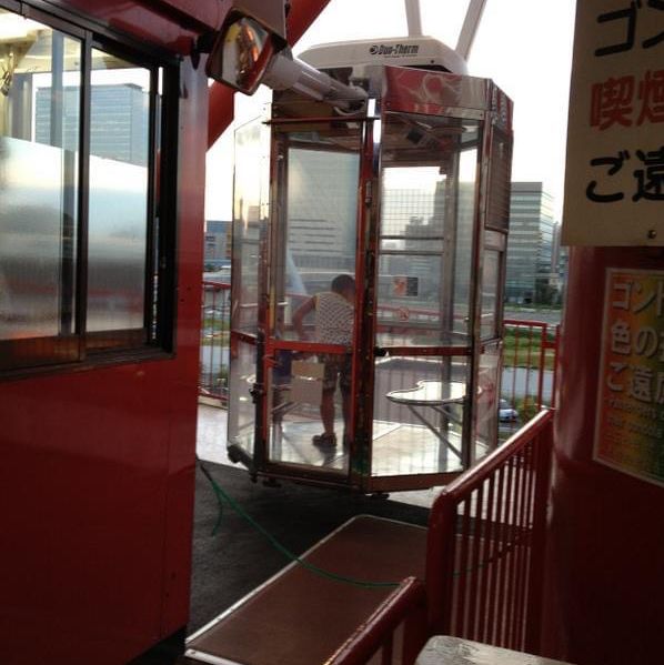 Ferries wheel on top of shopping center 