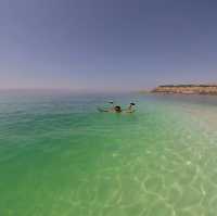 Floating in the dead sea, Jordan.