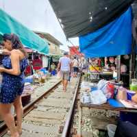 Morning market beside railway - Maeklong Station 