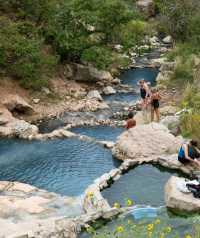 Soak in the ancient hot springs in the wilderness of Utah.