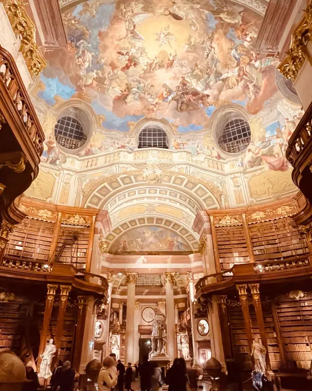Experience the vast universe of Baroque style knowledge at the Royal Library.