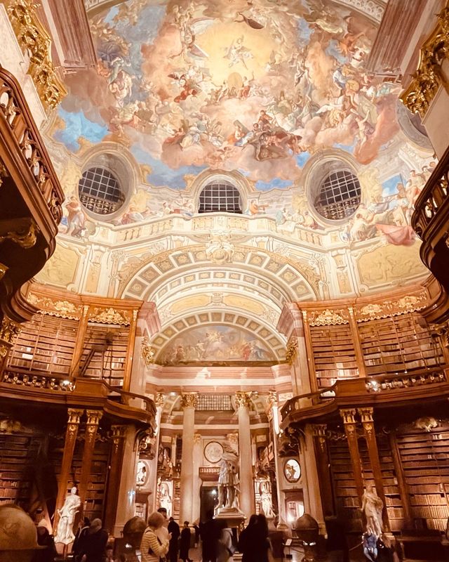 Experience the vast universe of Baroque style knowledge at the Royal Library.