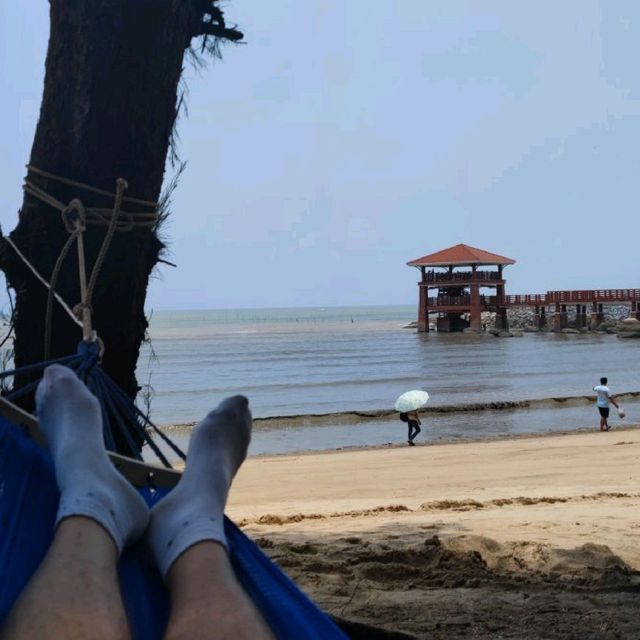 Beach nestled in a fishing village 