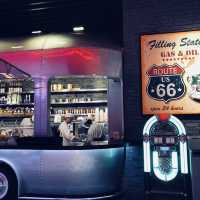Eating comfort food in a car at Macau Studio City 