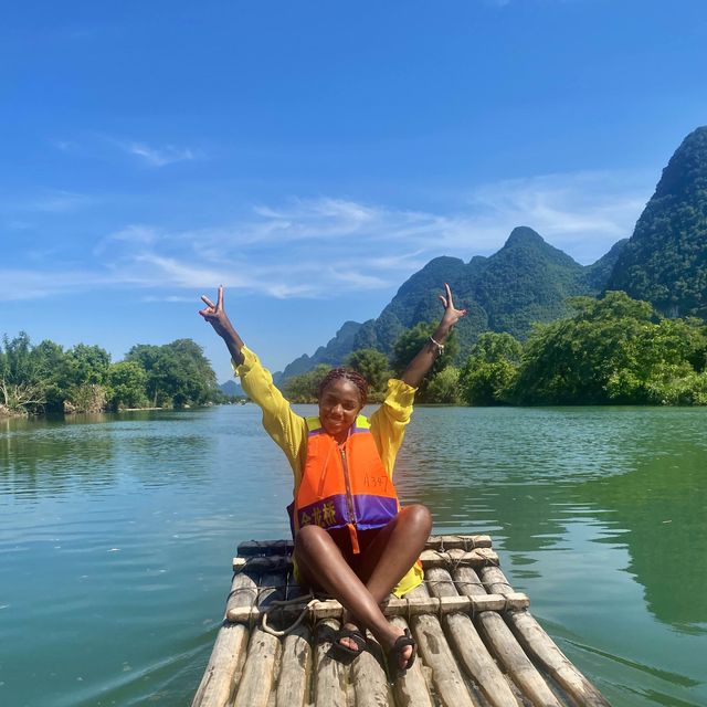 Bamboo boat rafting along Yulong river 