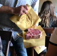 Eating Bistecca Fiorentina in Montepulciano
