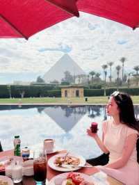 Have breakfast under the pyramid.