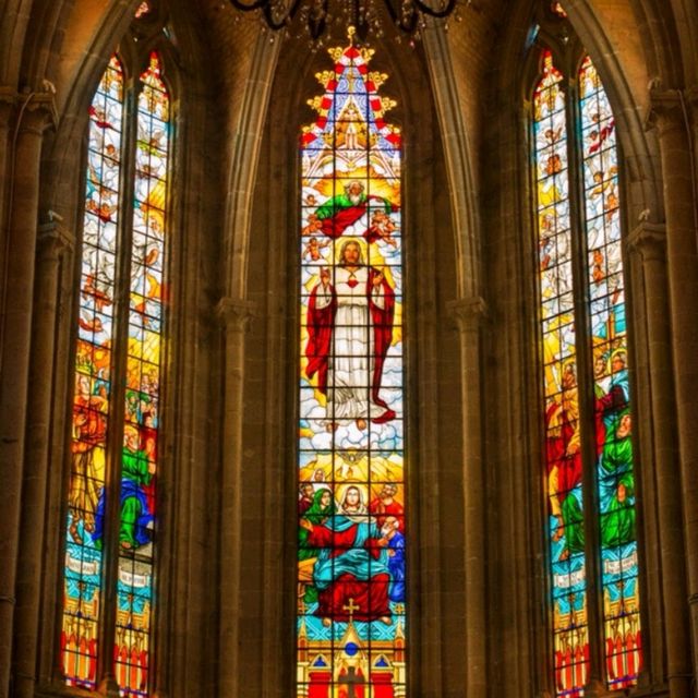 A cathedral in the middle of a modern city