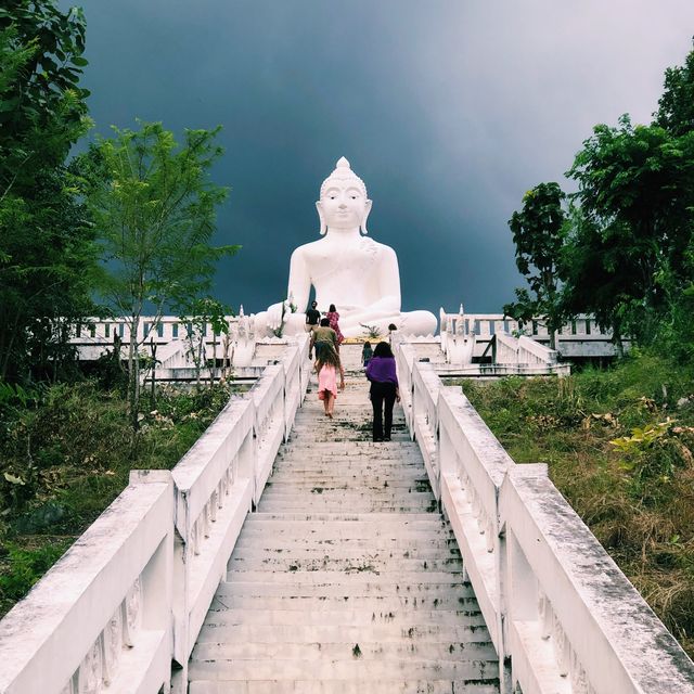 huge white Buddha overlooking the city of Pai