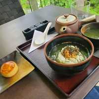 Relaxing Tea Spot in a Lush Japanese Garden