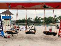 Lazy swing hammocks by the beach