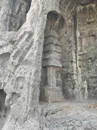 Headless Buddhas at Longmen Grottoes