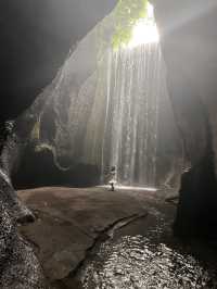 Spectacular cave waterfall in Bali