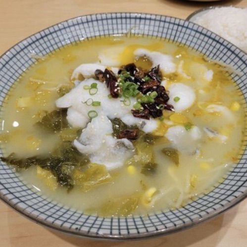 喜出望外酸菜魚店