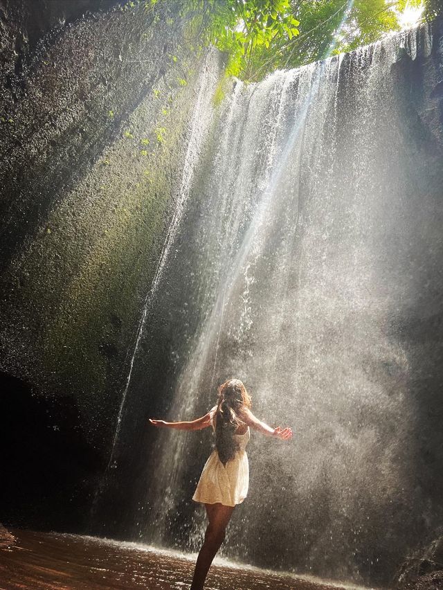 Spectacular cave waterfall in Bali