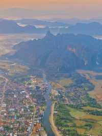 Laos Travel Guide | Watch the sunrise from the world's cheapest hot air balloon ride!