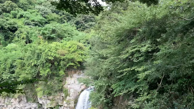 Cheonjeyeon Falls with turquoise water 