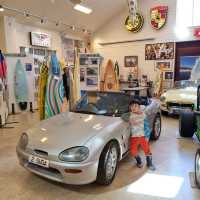 Vintage Cars & Surf Board at Aravina