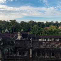 Climbing the tower of Angkor Wat