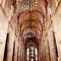 A cathedral in the middle of a modern city