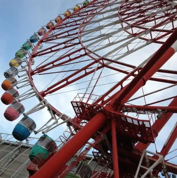 Ferries wheel on top of shopping center 