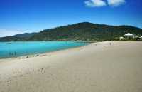 Clear water and fine sand at Sanyi Beach.