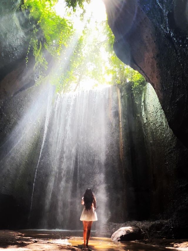 Spectacular cave waterfall in Bali