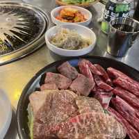 Marinated crabs and grilled meat at Mr. Korean BBQ