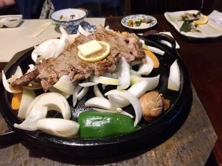 A generous steak of rare Akagyu beef