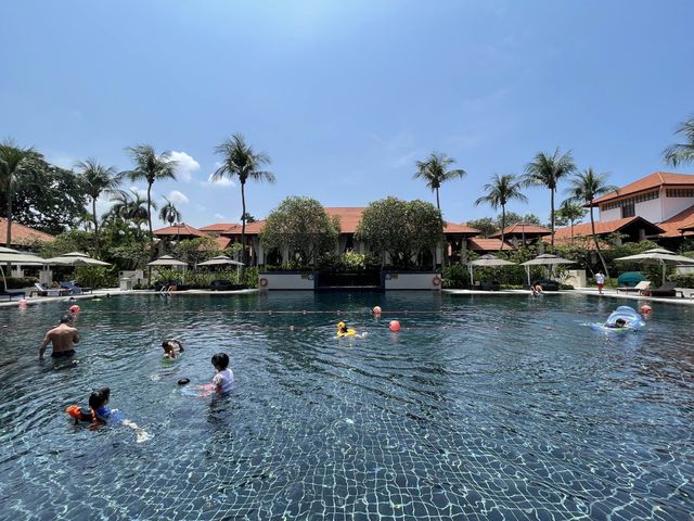 Soak in a resort swimming pool