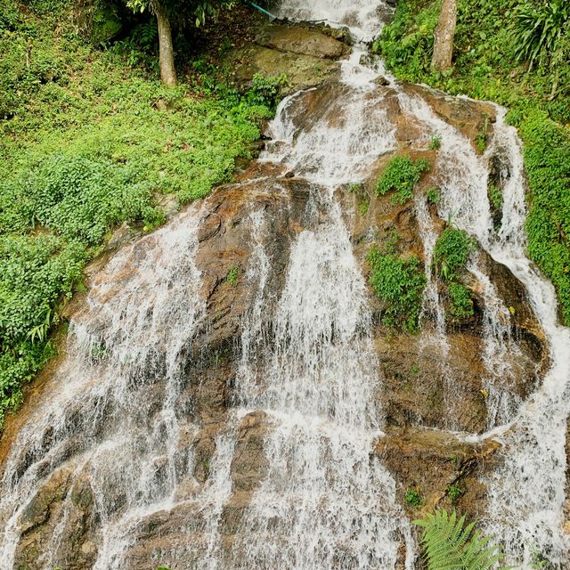 Traditional Hmong Village with Waterfalls