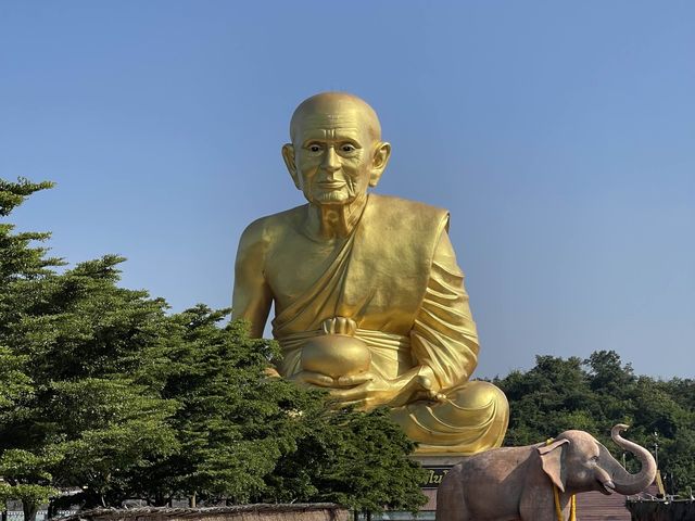 Gigantic Gold Monk Statue in Khao Yai 