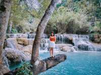 With a drone, see the panoramic view of Kuang Si Falls in Luang Prabang.