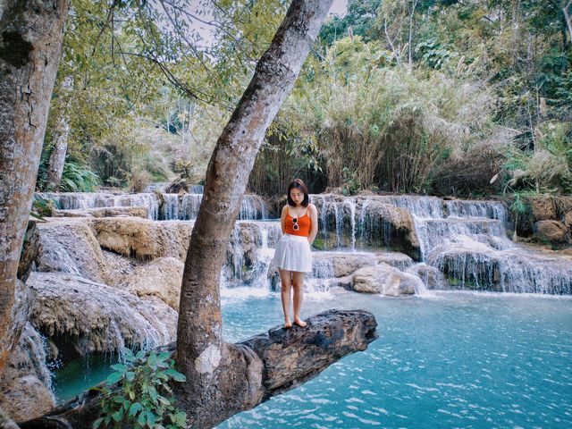 With a drone, see the panoramic view of Kuang Si Falls in Luang Prabang.