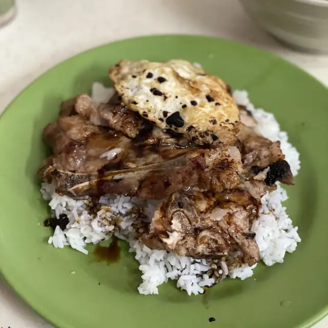 Iconic pork chop rice 