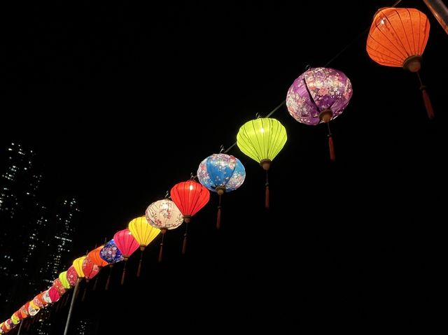 Colorful lantern next to the dark sea side