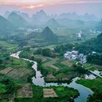 Flowing rivers, mountains, and paddy fields of Guilin