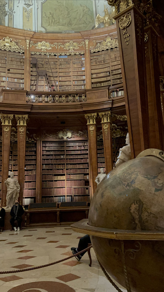 Experience the vast universe of Baroque style knowledge at the Royal Library.