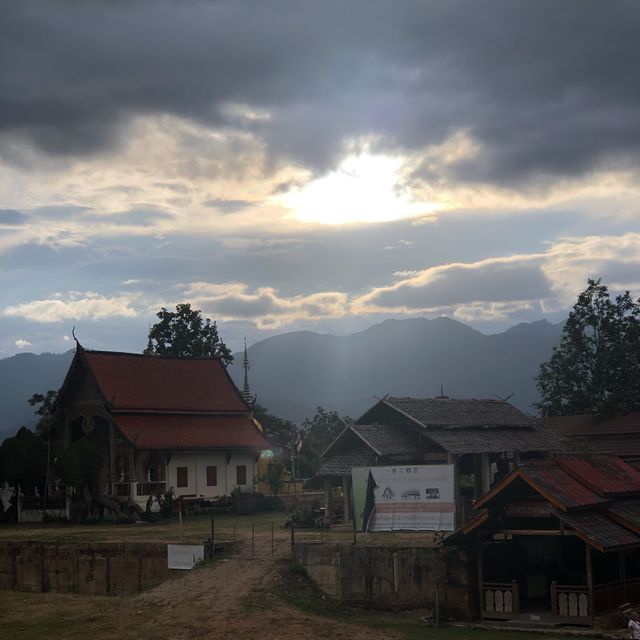 huge white Buddha overlooking the city of Pai