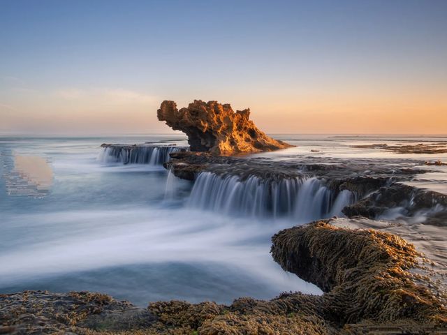 Another reason to travel to South Korea: check in at the Dragon Head Rock, a 2 million-year-old landmark on Jeju Island.