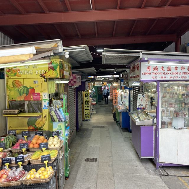 Buying stamps at Man Wa Lane (Chop Street)