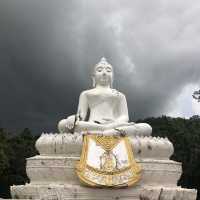 huge white Buddha overlooking the city of Pai