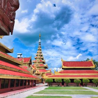The Palace that was completely made from teak wood was built in the center of a large citadel or fort. The square citadel was surrounded by four walls each 2 kilometers long with a total of 48 turrets. In the walls were 12 gates, one for each sign of the Zodiac. Around the walls was a 60 meter wide moat, crossed by a number of bridges.

In 1885 during the reign of King Thibaw Min the British took Mandalay ending the Konbaung dynasty. The Palace was looted and converted into a fort for the British army. During the second World War the Royal Palace was destroyed by fire after a bombing raid. The only two original buildings that survived are the Royal mint and the watch tower. During the 1990’s the Palace was rebuilt following the original design but partly using modern materials as concrete.

Inside the Palace there are some artifacts on display in glass showcases and several reproductions of thrones. Much of the original artifacts that were in the Palace at the end of the 19th century are still on display in a British museum. Several rooms of the Palace display life size statues of King Mindon Min and his successor King Thibaw Min, the last Burmese King. Today part of the citadel complex is used by the Burmese army, the Palace and surrounding gardens are open to the public.#nationalpark