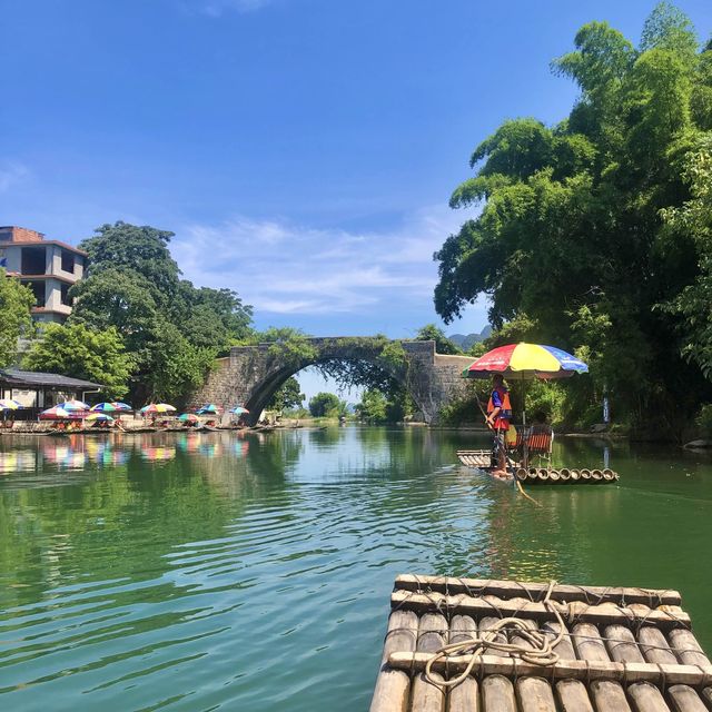 Bamboo boat rafting along Yulong river 