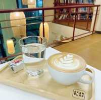 Library in Cafe or Cafe in Library?