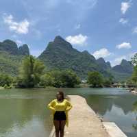 Bamboo boat rafting along Yulong river 