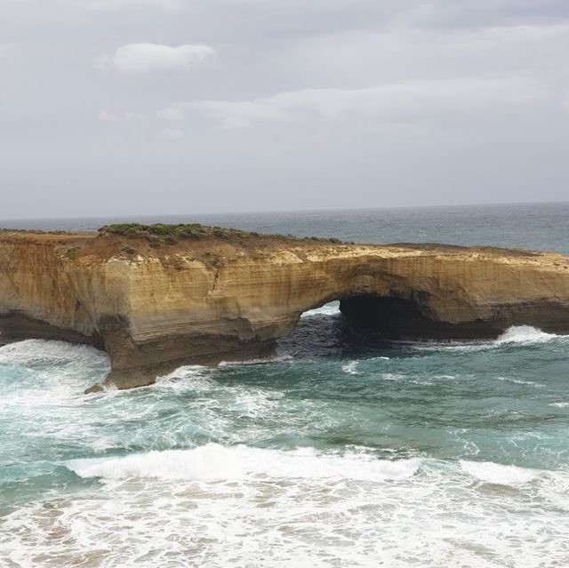Natural arch broken by wind and sea