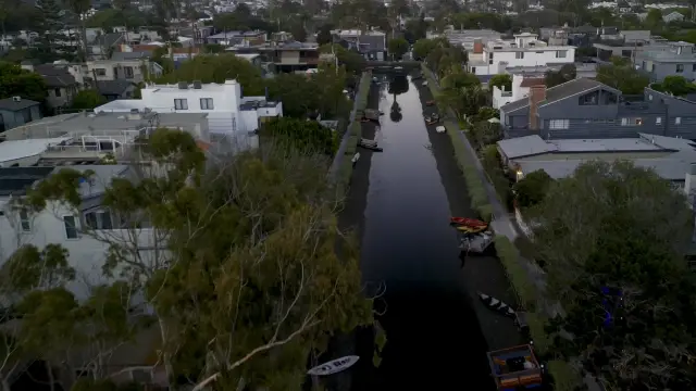 Flying over magical Venice canals at sunset 