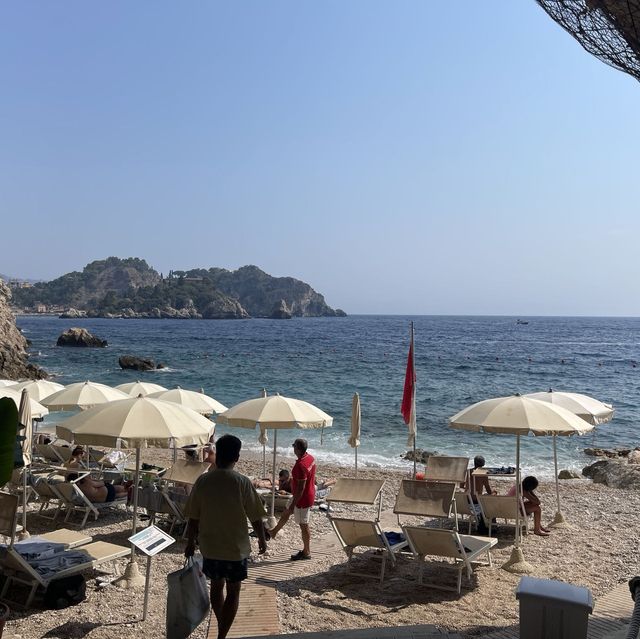 The beach through the rocky cave of Sicily